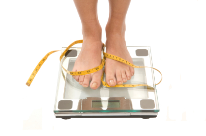 woman's feet on scales